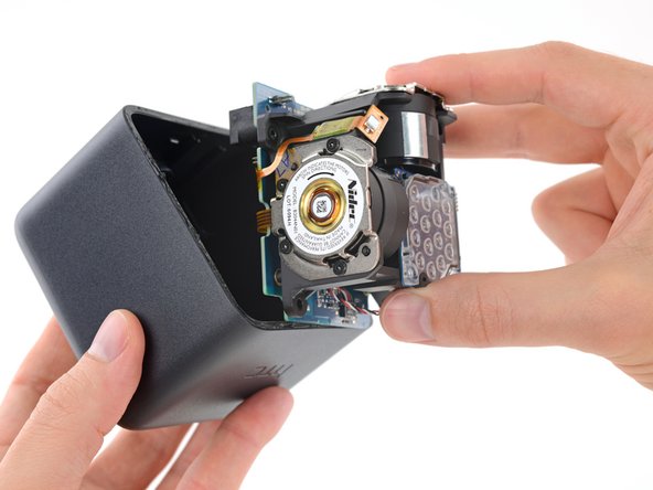 Image 1/2: Aaaand we're done. Lucky for us, the whole unit is installed as a single assembly within the Lighthouse base station housing. Just remove the four Torx screws, and it falls right out.