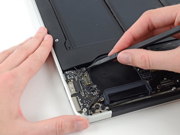 Image 2/2: Make sure you are flipping up the retaining flap, '''not''' the socket itself.