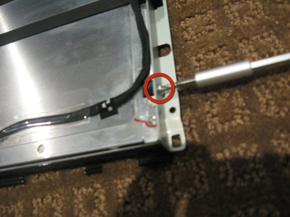 Image 1/3: Use a T10 Torx driver to remove the 2 screws from each side bracket (total 4 screws)