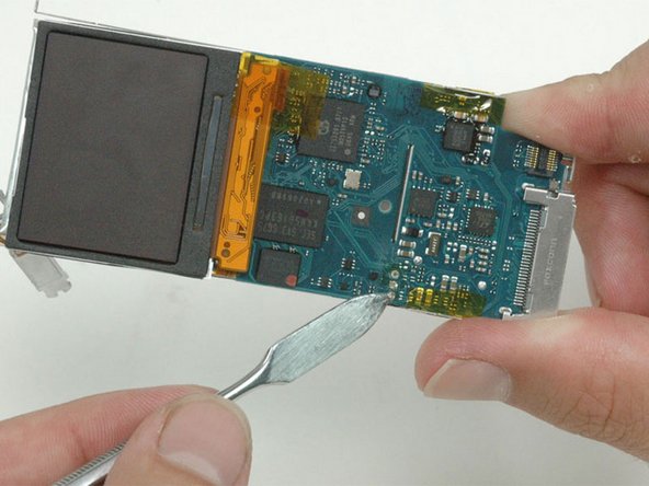 Be careful not to scrape the metal rings surrounding the connectors off the logic board. If you accidentally scrape these off, you won't be able to reconnect the replacement battery.