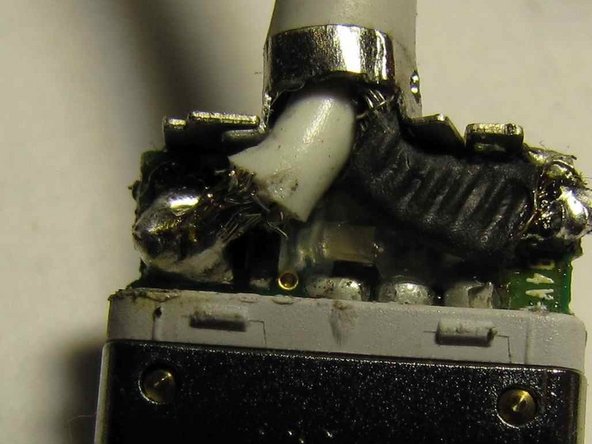 Image 1/1: This is just visible on the left hand side of the core in the picture. The right hand tab is a bit short of the tab on the right because I didn't get the cable decently centred!