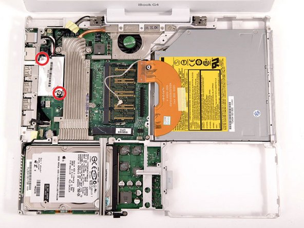 Due to variations between iBook G4 models, your modem may look slightly different from the picture. All of the following steps apply to either model.