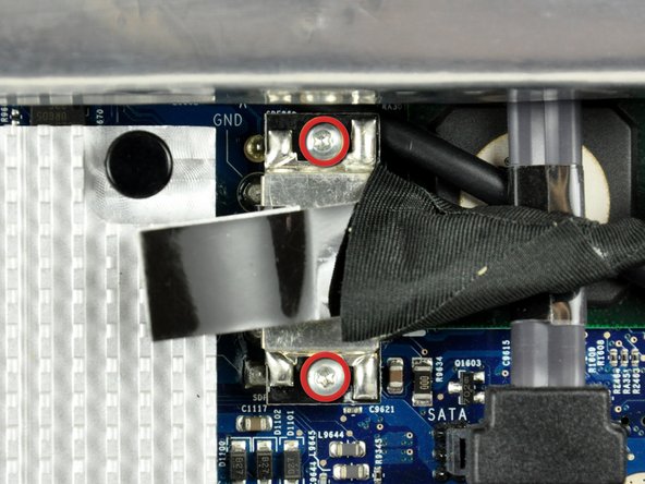 Image 1/2: Using its attached black tab, pull the display data cable connector up off the logic board.