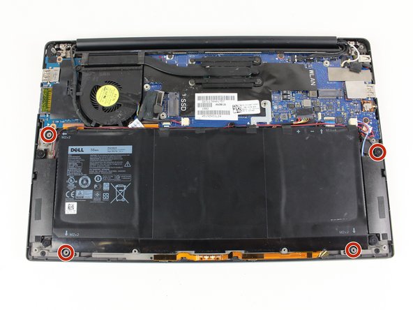 Remove the four 3 mm Phillips #0 screws located on each corner of the battery.