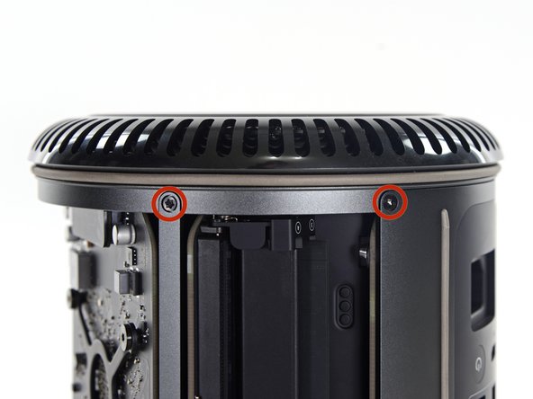 Image 3/3: Remove five 5.1 mm T10 Torx screws from the outer perimeter of the lower case.