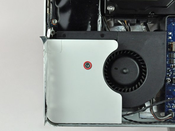 Image 1/2: The screw for the left speaker has coarse threads.