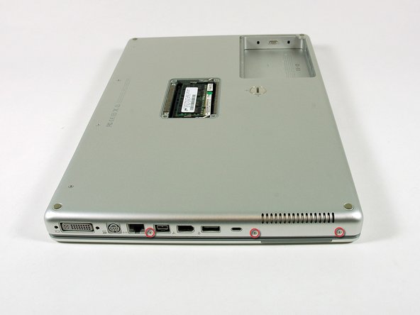 Image 1/1: Remove the three 3 mm Phillips screws along the edge of the lower case.