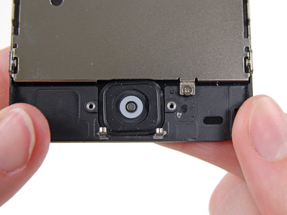 Image 1/2: Do not push the home button all the way through; you only need to get a corner free so that you can pry it out with a spudger.