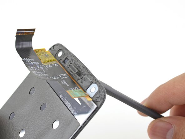 The earpiece speaker grille consists of two small mesh pieces. Be careful not to lose them as you transfer them over.