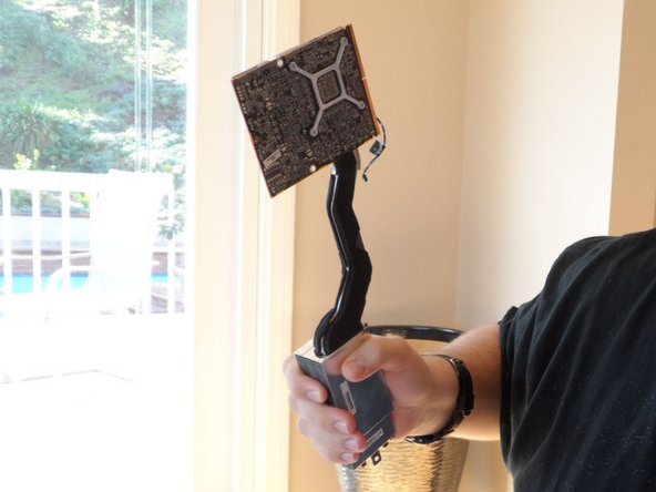 Image 3/3: ''You World of Warcraft players out there might agree my son and I thought the old video card makes a pretty authentic-looking Gnomish 1H axe. Glory to the Alliance!''  :-)