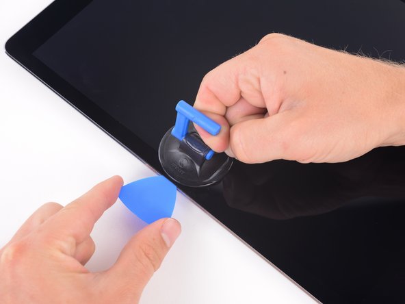 Do not insert the pick more than 2 millimeters. Going any farther will permanently damage the display assembly. If using a halberd spudger, slice with the shortest part of the blade.