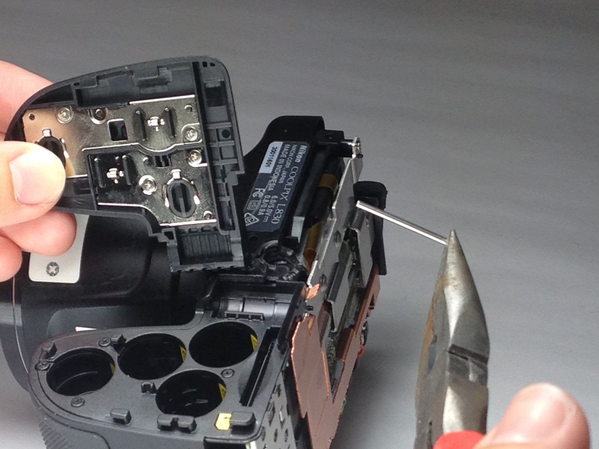 Nikon Coolpix L830 Battery Cover Replacement - iFixit Repair Guide
