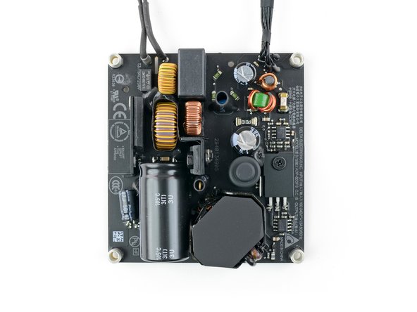 Image 2/2: Whatever you do, don't lick your fingers and then touch the large black cylinder. You may be ''shocked'' to discover what 400 V can do.