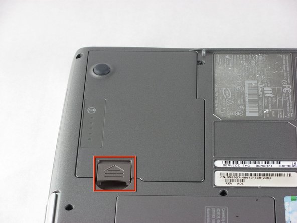 Push in the tab on the battery and lift up. The battery should detach very easily.