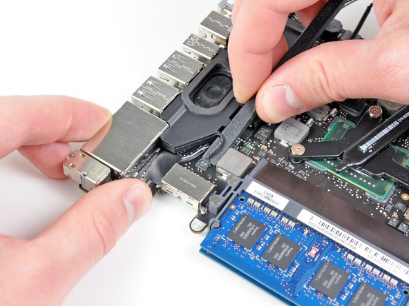 Image 1/1: Pry up from beneath the wires.