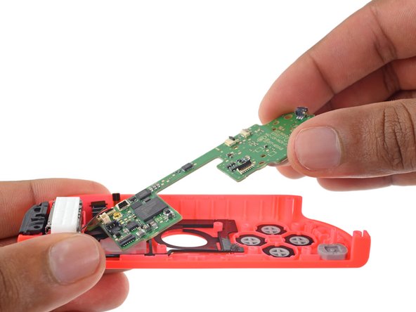 Image 3/3: You know what both have though? Two Phillips screws holding the joystick and two Phillips screws holding the board. That's what.