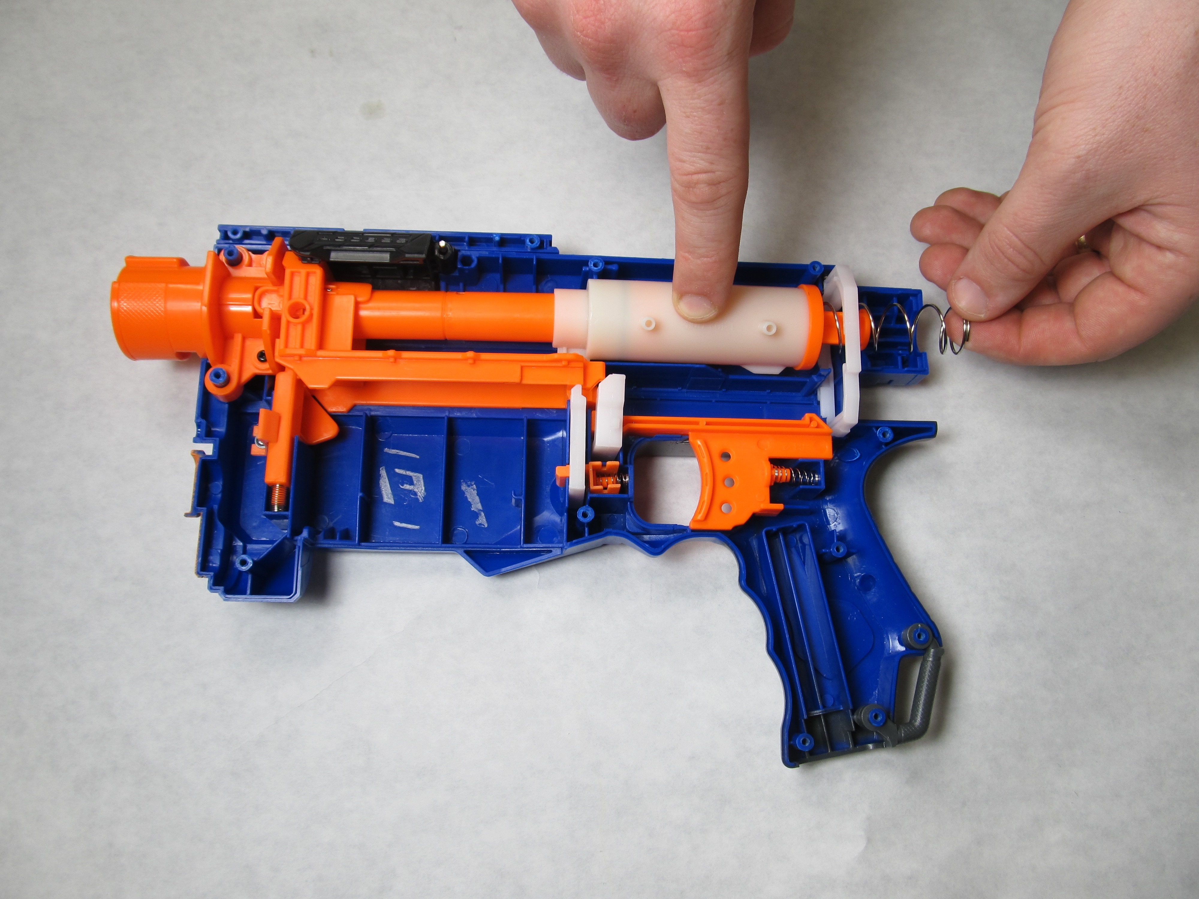 Nerf NStrike Elite Retaliator Spring Replacement iFixit Repair Guide