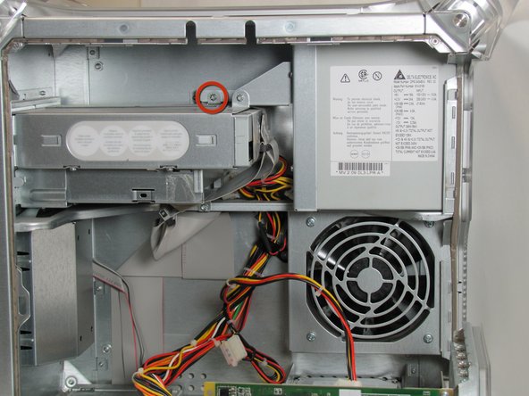 Image 1/2: The first screw can be seen in the first picture.