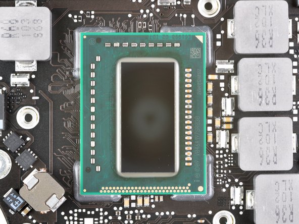 Image 3/3: In the third picture is the quad-core Intel i7 processor.