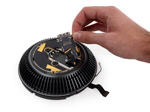 Image 3/3: Those three large screws secure the fan, with vibration-dampening rubber bumpers, like we've seen in [guide|11936|iMacs|stepid=42502].