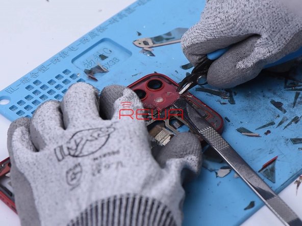 Then we remove the glass around the camera. Please do not touch the camera lens.