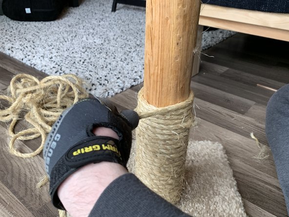 It's important to keep the rope tight as you wrap it so it doesn't come loose when your cat scratches on it.