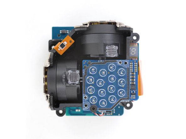Image 2/2: With the cover off, we get a look at the array of IR LEDs and spinning motor-mounted laser emitters, as well as a single IR photodiode that allows the device to sync up with its counterpart.