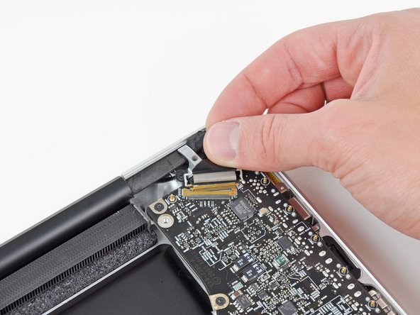 Image 3/3: The display data cable socket is very fragile. '''Do not''' lift the connector upward as you disconnect it, as the socket may break off the logic board. Pull the cable parallel to the face of the logic board.