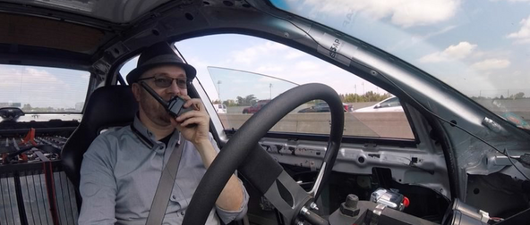 Eric Lundgren in his repaired Tesla