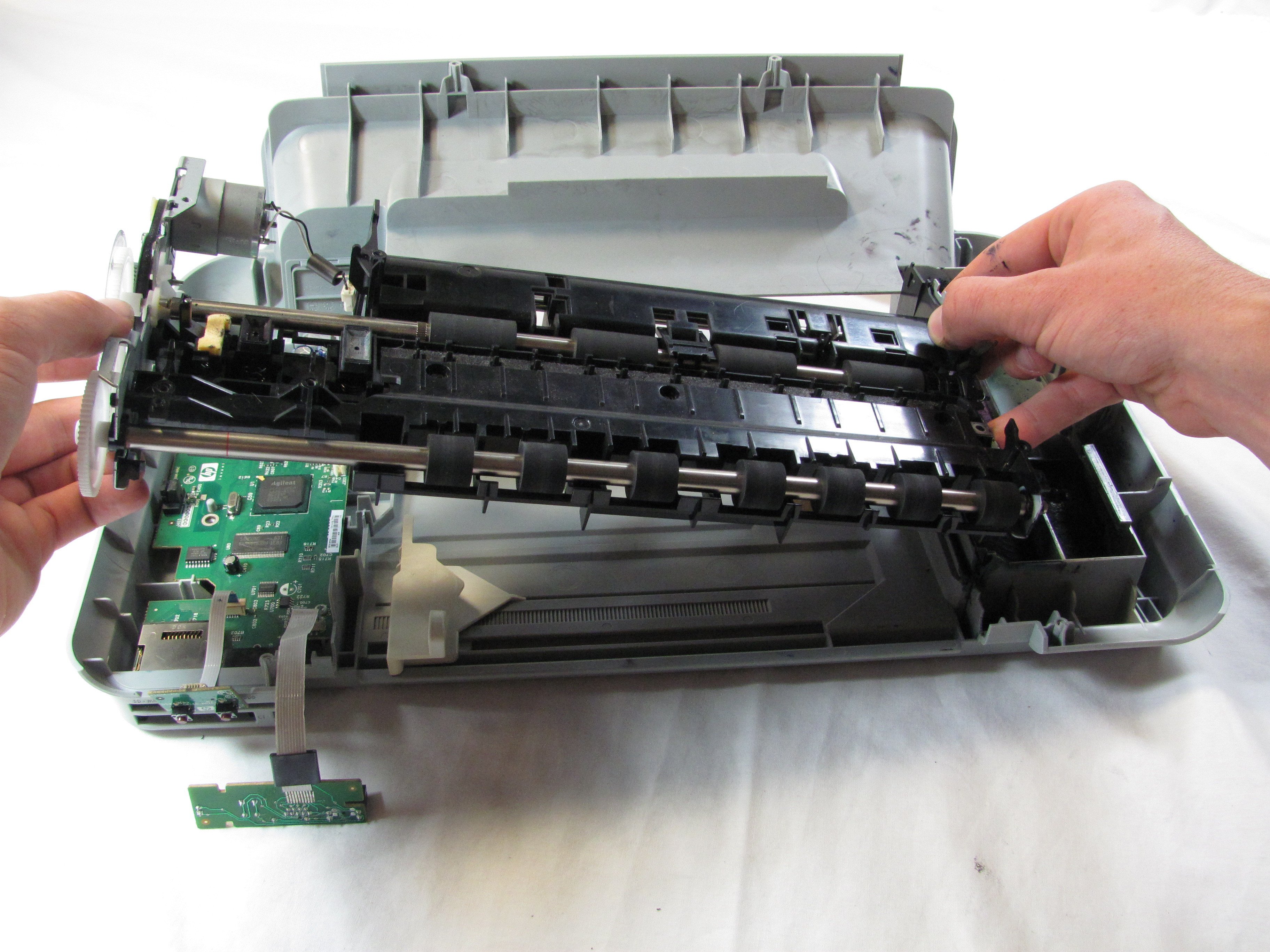Disassembling HP Photosmart c3180 Feed Roller Assembly Removal iFixit