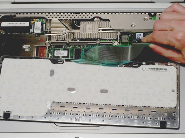 Image 1/1: Disconnect the keyboard connector from the logic board.