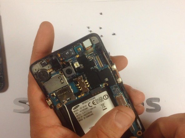 Careful release the motherboard from it's housing.