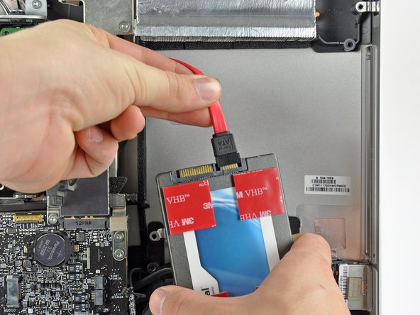Image 1/2: The SATA connectors will be nearest the top of the iMac when the hard drive is installed.