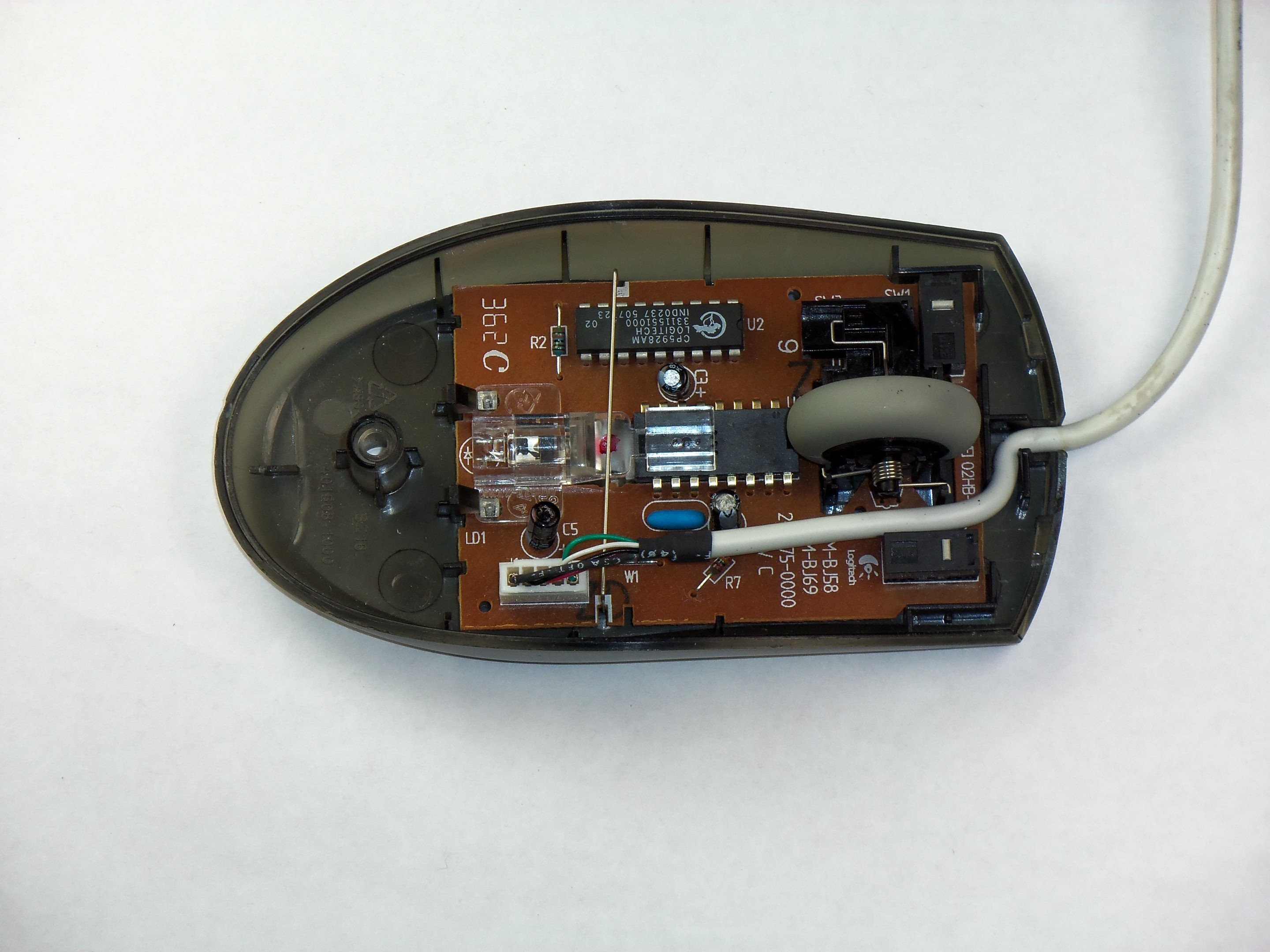 Removing the Logitech MBJ58 Mouse Scroll Wheel - iFixit Repair Guide