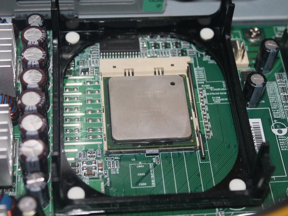 Image 1/3: Put some rubbing alcohol and wipe the CPU down till the CPU is clean