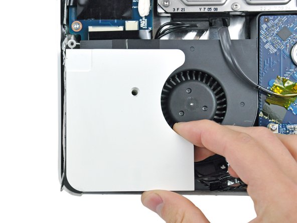 Image 2/2: The screw for the left speaker is longer than the screw for the right speaker.