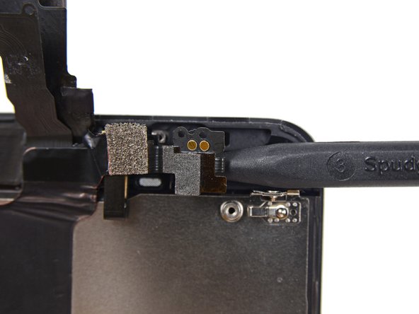 Image 2/2: If replacing the proximity sensor make sure that the holder remains adhered to the back of the display. If it comes off with the old proximity sensor, remove it from the old sensor and use a tiny bit of adhesive to re-attach it to the back of the display.