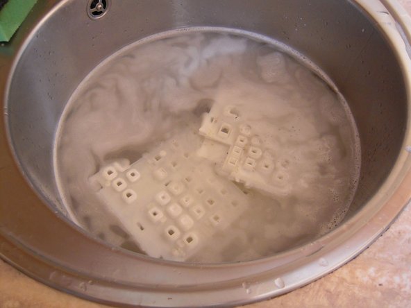 Image 3/3: The key caddies can be washed in the sink.