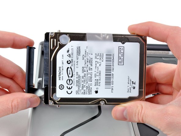 Image 3/3: Remove the hard drive.