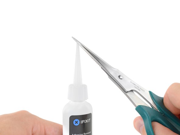 This unseals the bottle and allows the pressure to equalize before you cut the applicator tip. If you skip this step, the adhesive remover may spray out unexpectedly when the tip is cut.