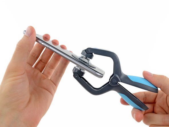 Image 1/2: The iSclack is designed to safely open your iPhone just enough to separate the pieces, but not enough to damage the display cables.