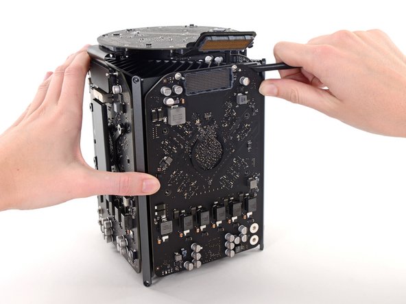 Image 1/3: You may need to pry very gently with a spudger to separate the card from the heat sink.