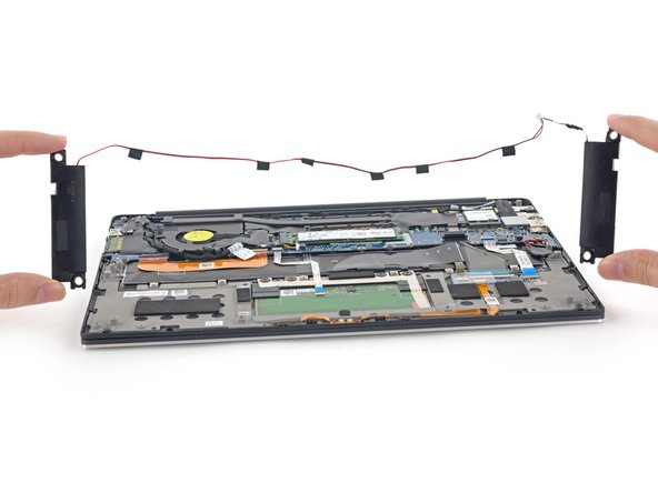 The speakers rest on vibration dampening rubber grommets. Squishy.