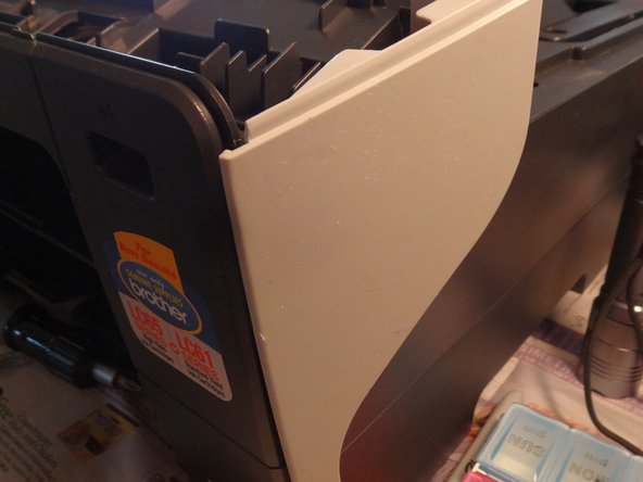 Remove the front corners by gently pulling upwards