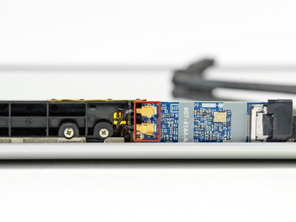 Image 1/2: Be careful not to break the sockets off the AirPort board.