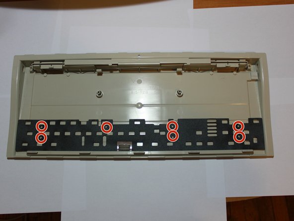 Image 1/3: This is easiest to do if you start from one side, apply downward pressure, and continue to each subsequent set of clips.