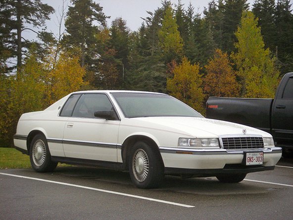 1998 cadillac seville sts battery location