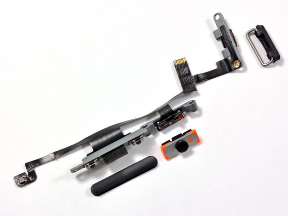 Image 1/2: The speaker assembly is the next victim on our list. Farewell speakers!