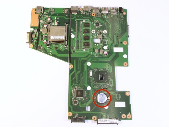 Flip over the motherboard and locate the CMOS battery.