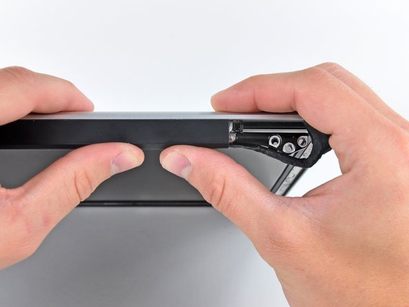 Image 2/2: When reinstalling the clutch cover, be sure to slip it over the components protruding from the lower edge of the display about .25" to the right of its final installed position on the display.